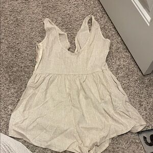 Beige Sleeveless Romper size Small never been worn